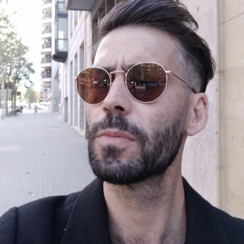 Spin in My Head cover: a man in round tinted sunglasses on a city street